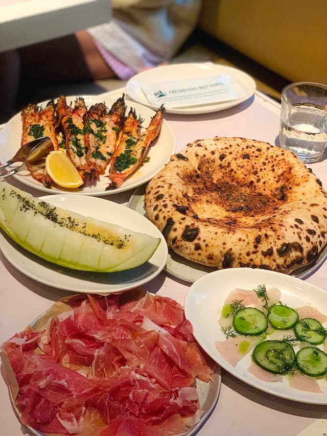 Wood-fired bread is a must-order at Bar Totti's in Wynyard and Bondi Beach.
