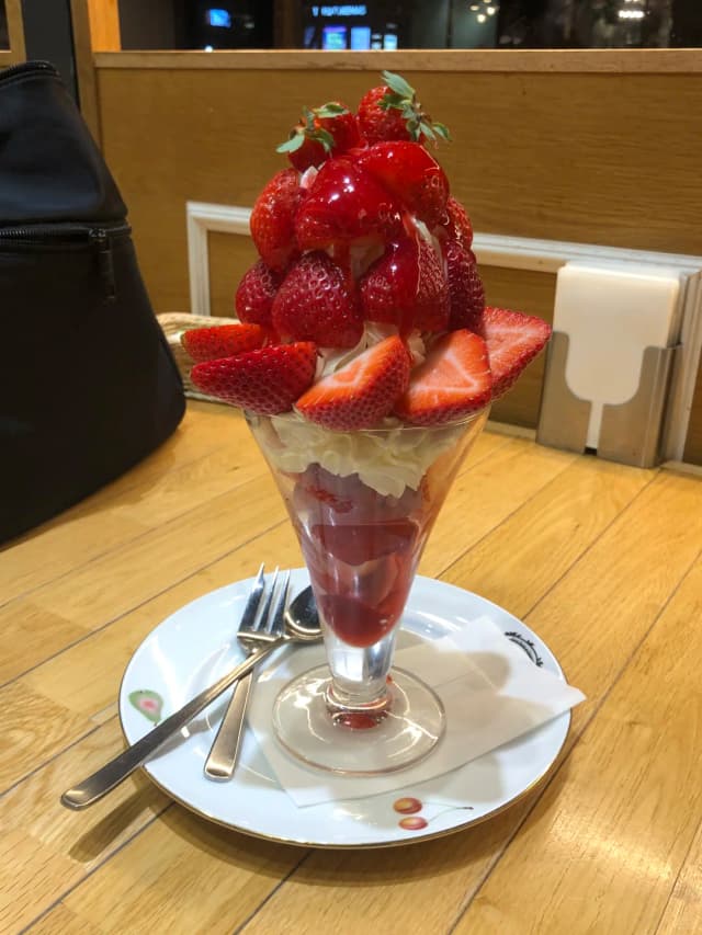 Each month features a different seasonal parfait, and the creation looks exactly like the hand-drawn menu illustration—beautiful and delicious.