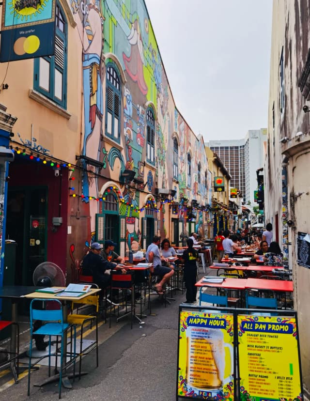 Haji Lane: A pre-war old street transformed into a vibrant graffiti alley, bustling with unique boutiques and trendy cafes.