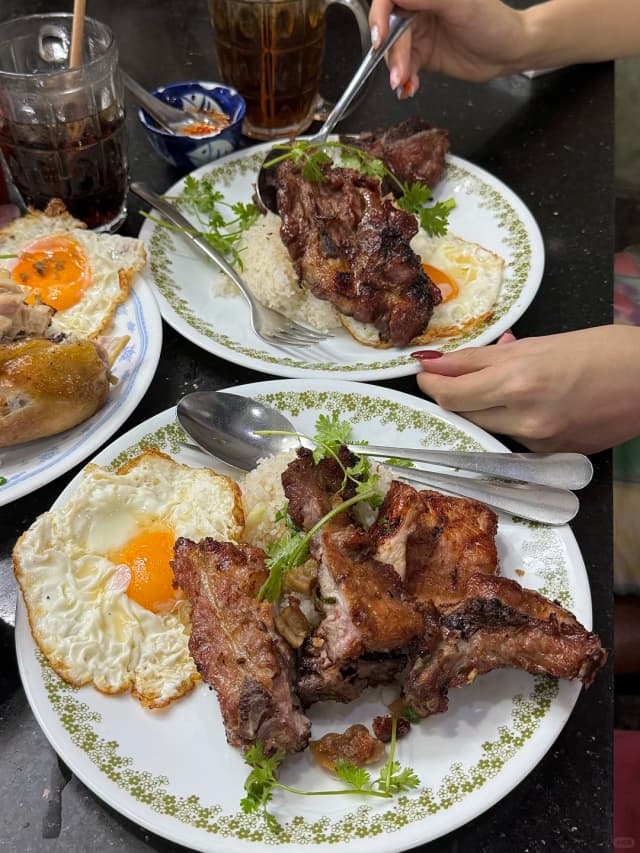 Their sweet pork chop, perfectly paired with an egg and rice, is absolutely delicious!