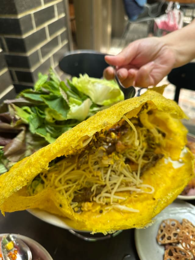 The Lamb Banh Xeo at Hello Auntie is a must-try with tender lamb and no gamey taste, wrapped in a crispy coconut pancake.