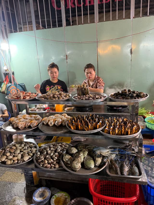 Beyond Ben Thanh Market, explore Ho Thi Ky, a vibrant flower street that transforms into a bustling night market where you can find all kinds of delicious local snacks!