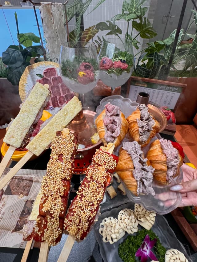 The softness of the croissant paired with savory boiled meat and chewy tripe was the most satisfying and surprising dish I've had all year.