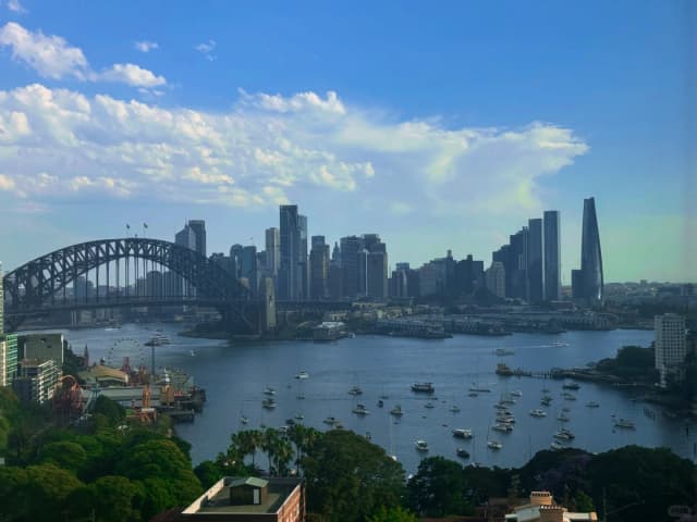 North Sydney offers a peaceful escape with lush greenery and stunning views of the city skyline.